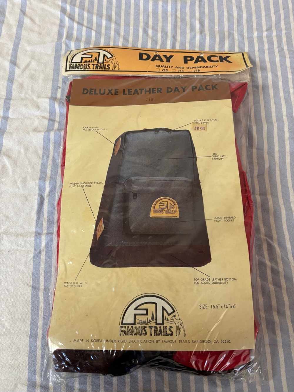 Vintage Deluxe Leather Day Pack - Black and Red in its original packaging